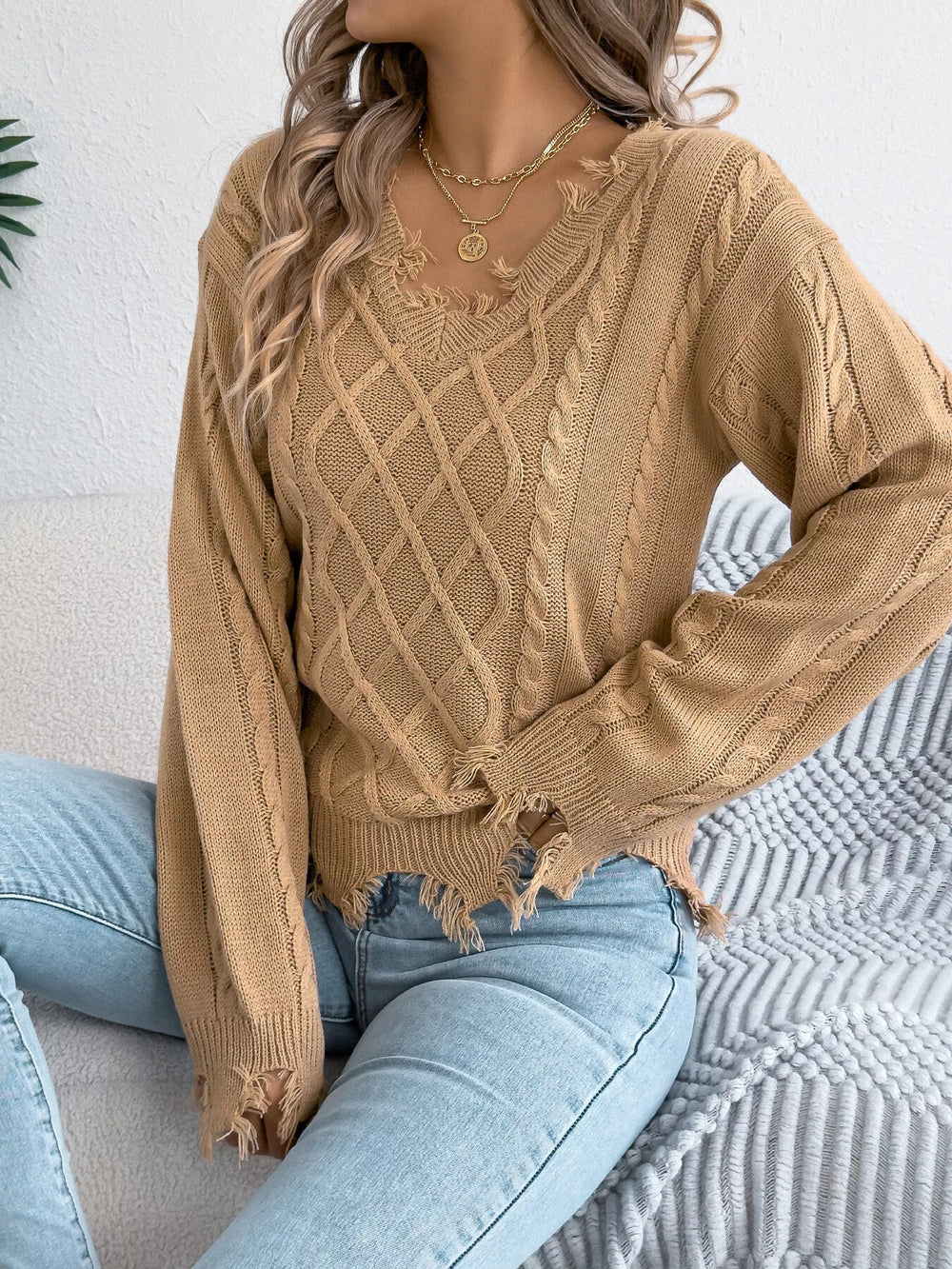 V-Neck Distressed Hem Cable Knit Sweater