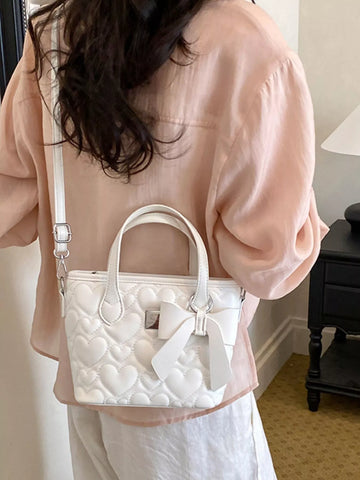 Chic Quilted Heart Crossbody Bag with Bow Accent