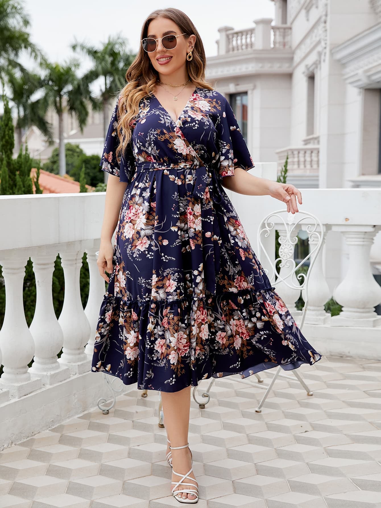 Honey Plus Size Floral Surplice Neck Midi Dress selected from Midi Dresses for The Perfect Middle: The Midi Dress Edit
